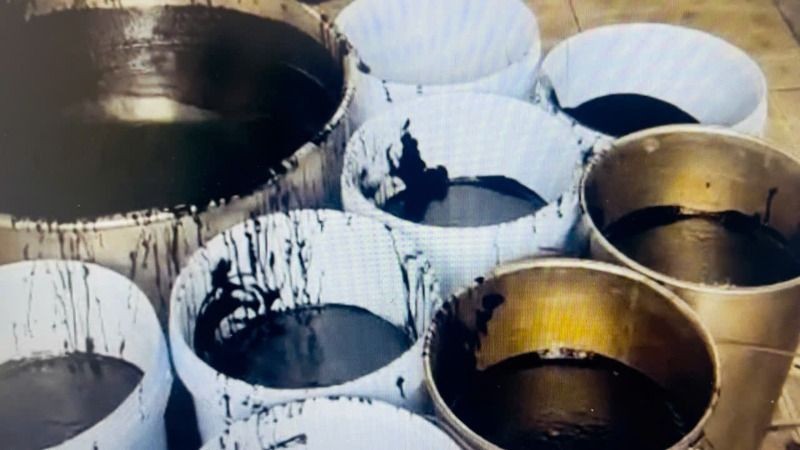 Dung dịch phụ gia pha sẵn dùng trong sản xuất cà phê giả.